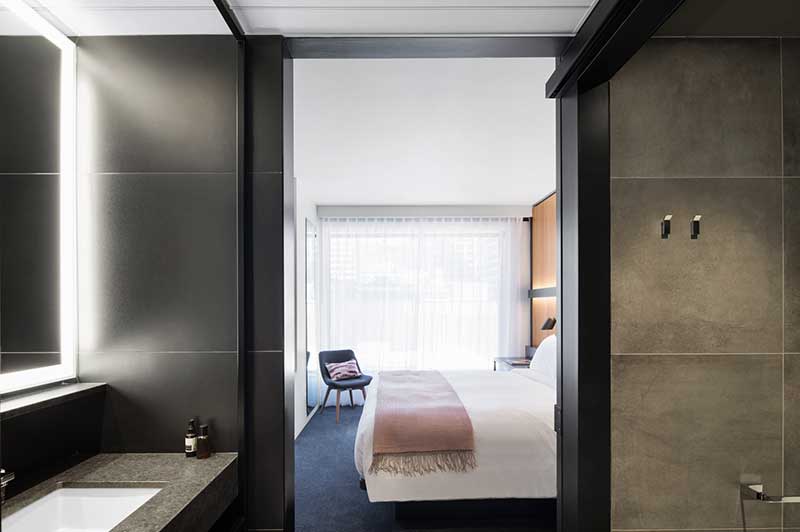 Hotel Room With Grey Accented Bathroom