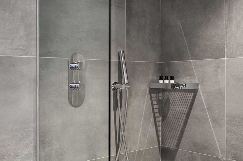 Hotel Suite Shower With Grey Tile